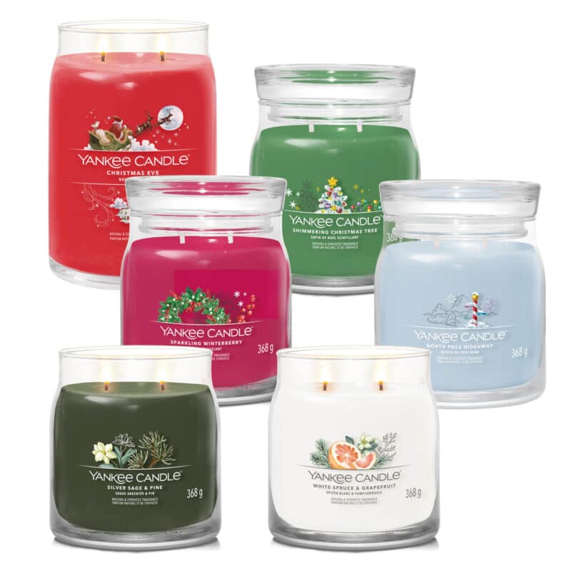 Samlingsbild av Yankee Candle i olika dofter och färger för jul och vinter.