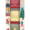 Alt-text: Tre Yankee Candle-doftljus i en vinterinspirerad förpackning med festliga motiv.